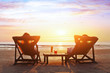 Leinwandbild Motiv happy couple enjoy luxury sunset on the beach during summer vacations
