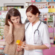 © DC Studio - Woman doctor and client inside pharmacy