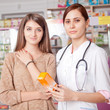 © DC Studio - Woman doctor and client inside pharmacy