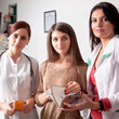 © DC Studio - Two doctors and one client inside pharmacy