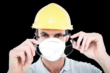 Poster - Composite image of worker wearing protective glasses