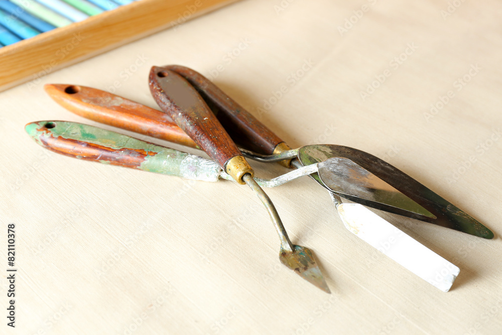 Palette knife on fabric background