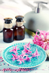 Beautiful spa composition with hyacinth flowers, close up