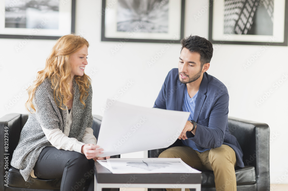 Artist and gallery owner talking in art gallery Stock Photo | Adobe Stock