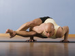 © Erik Isakson/Blend Images - Hispanic man practicing yoga