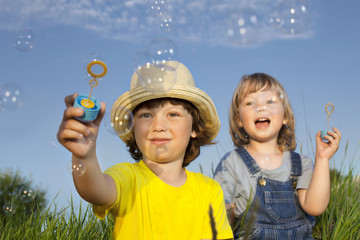 boy play in bubbles