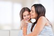 © BillionPhotos.com - Adorable. Mother and Baby kissing and hugging. Happy Family