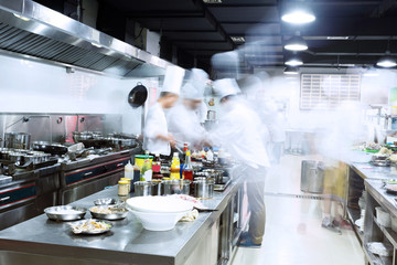 Wall Mural - modern kitchen and busy chefs