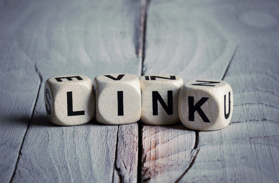Word Link written on wooden blocks. Vintage style.