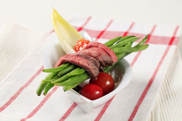 Sticker - Strips of roast beef  and string beans