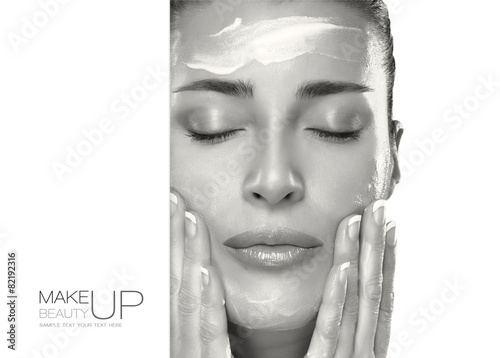 Naklejka na szybę Skin Care Concept. Spa Woman Applying Moisturizer on Face