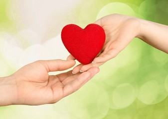 Poster - Heart. Health and charity concept - close up of woman hands