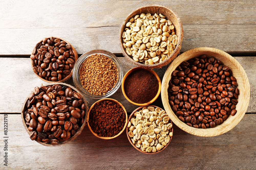 Various of coffee in small dishes on wooden table, top view