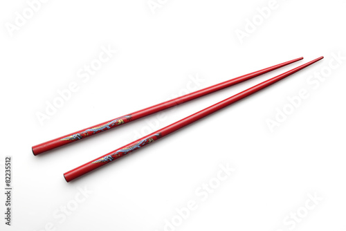 Fotografie, Obraz Red wooden chopsticks on white background