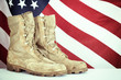 © leekris - Old combat boots with American flag