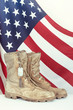 © leekris - Old combat boots and dog tags with American flag