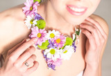 Fototapeta Tulipany - Woman with flower necklace