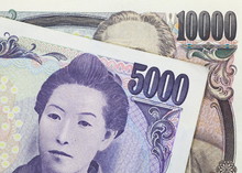 Stack Of Japanese Currency Yen Or Japanese Banknotes .