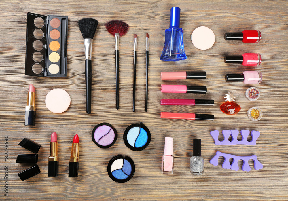 Various cosmetics on wooden background