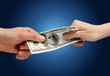 © BillionPhotos.com - $. Business transaction / power struggle / giving & spen