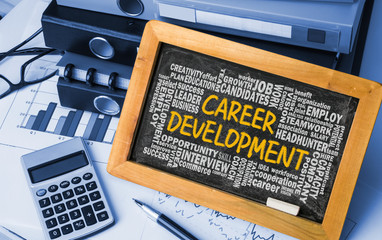 Wall Mural - career development with related word cloud hand drawing on black