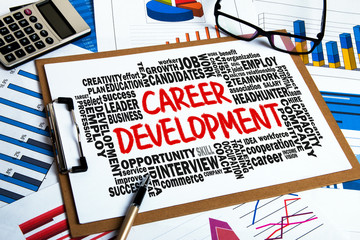 Wall Mural - career development with related word cloud hand drawing on clipb
