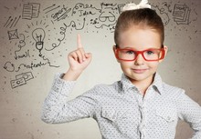Boy. Genius Boy In Red Glasses Near Blackboard With Formulas