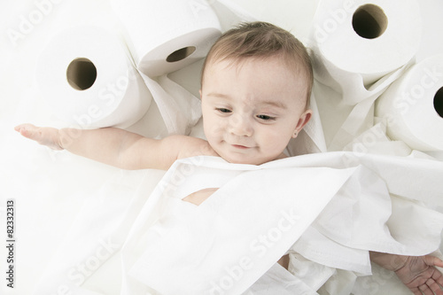Fotografia, Obraz Toddler ripping up toilet paper in bathroom studio