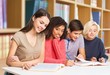 © BillionPhotos.com - Student. Young Students Studying Together In Classroom
