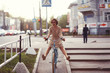 Leinwandbild Motiv cheerful girl on a bicycle movement