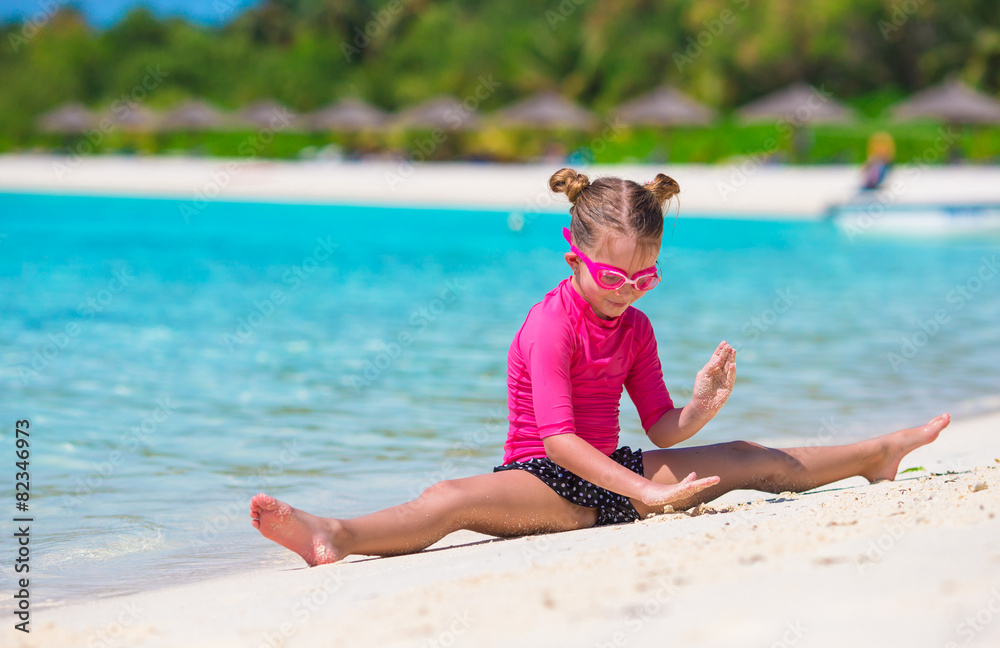 Adorable little girl at beach during summer vacation Stock Photo