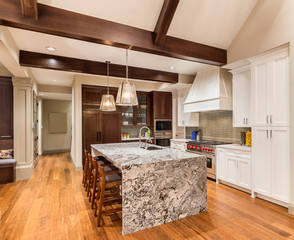 kitchen with island in new luxury home