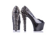 © Elisanth - Pair of black high heel shoes with spikes