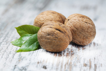 Sticker - Walnuts on a wooden.