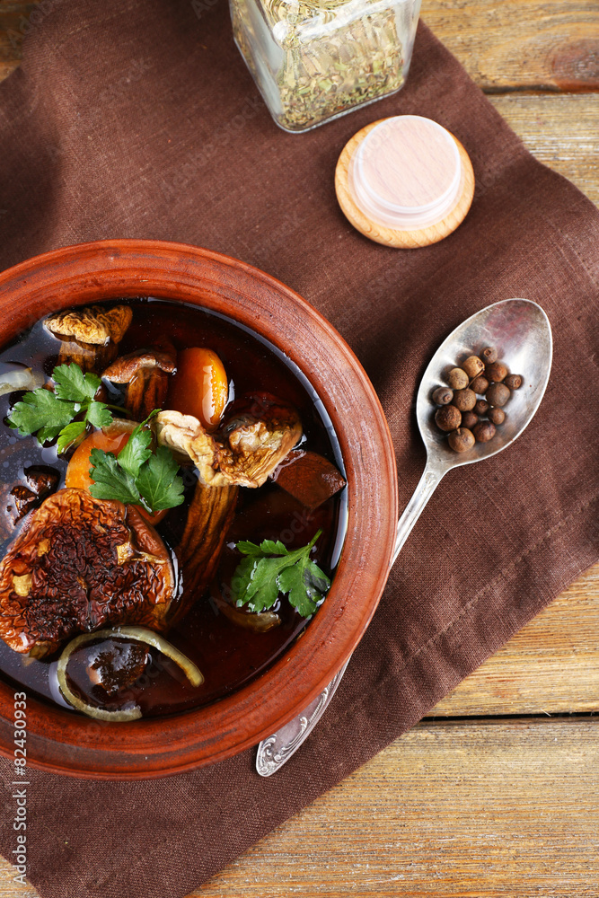 Mushroom soup on brown napkin, closeup