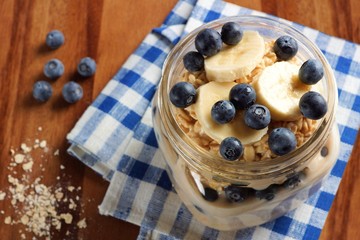 Wall Mural - blueberry and banana breakfast oatmeal in a mason jar