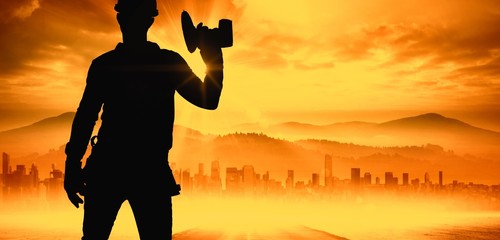 Poster - Composite image of handyman wearing tool belt