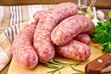 Sausages pork on board with knife