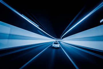 speeding car through tunnel