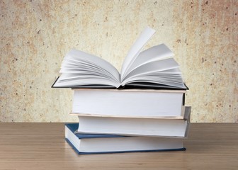 Wall Mural - Book. A pile of books with library on the back