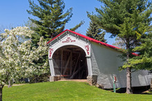 White Covered Bridge With Red Roof