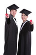 © ryanking999 - Two happy graduates student