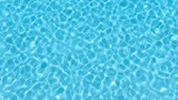 Fototapeta  - Blue swimming pool rippled water detail