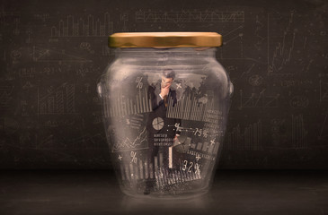 Poster - Businessman traped in jar with graph chart symbols concept