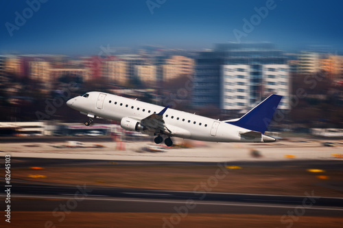 Tela Airliner taking off from the airport - motion blur