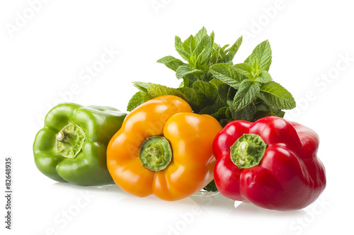 Naklejka nad blat kuchenny colored peppers close up over white background