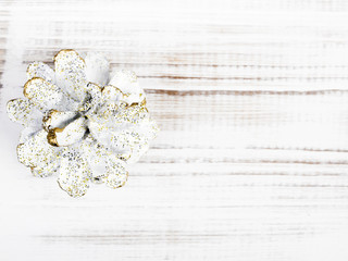 white cone on white wooden background