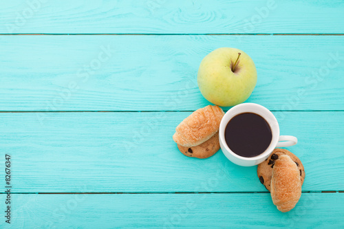 Fotografie, Tablou Breakfast with coffee on blue wooden background