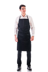 Wall Mural - Full length shot of young chef or waiter posing isolated 