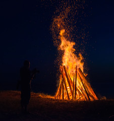 Wall Mural - Big bonfire against dark night sky